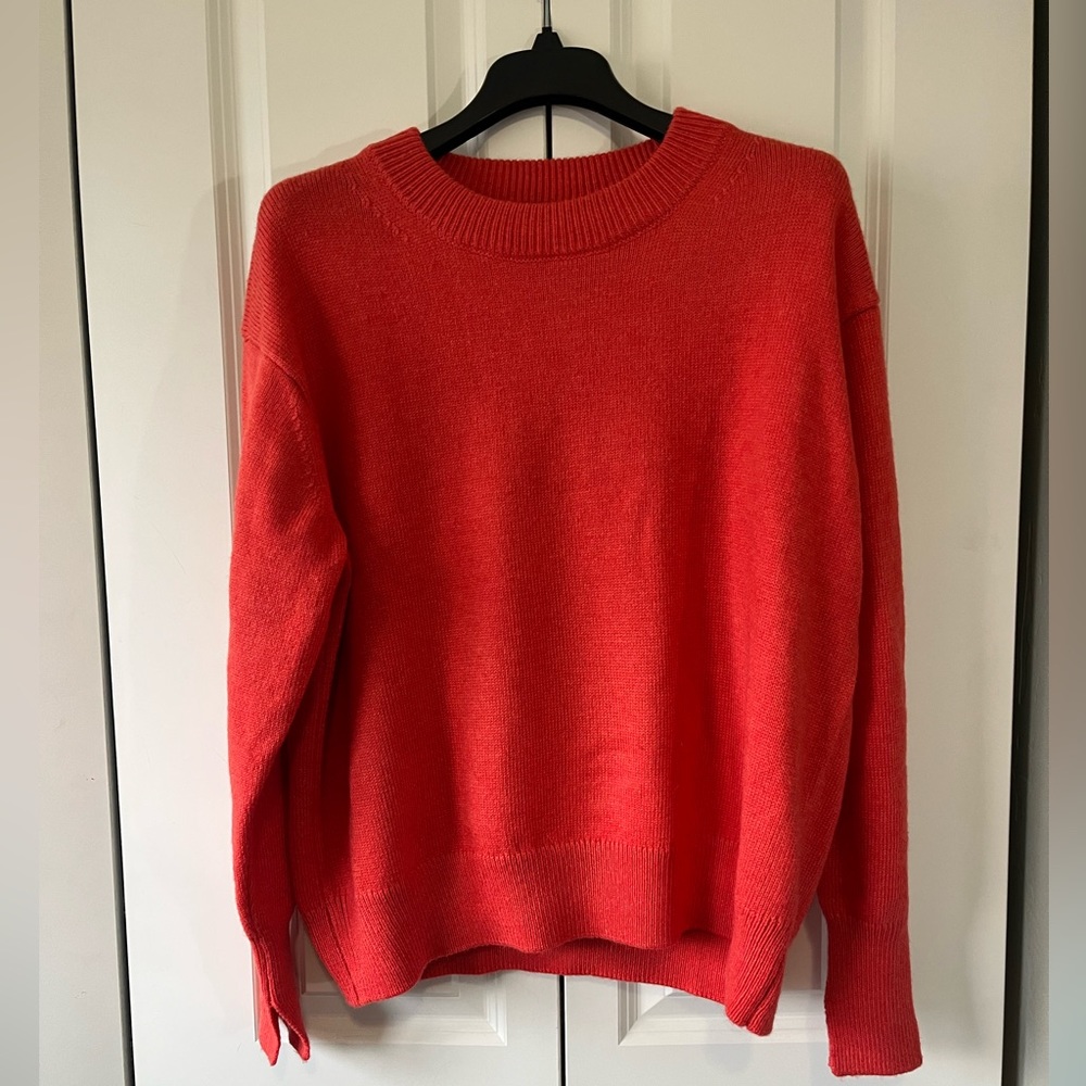Orange crew neck split cuff sweater